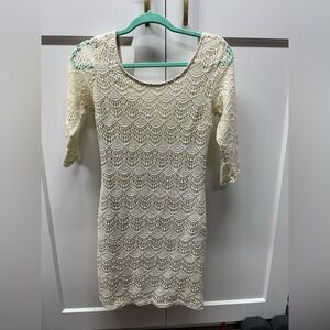 Cream colored lace dress. Size medium.